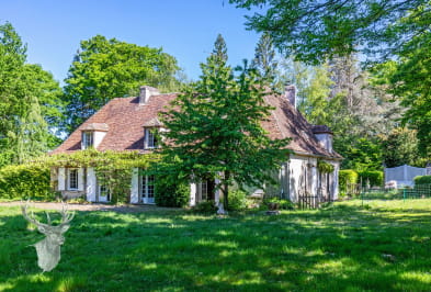 Demeure de caractère avec un grand garage de 190 m² au sol