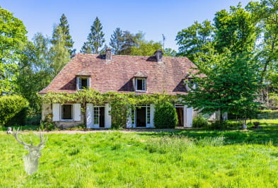 Demeure de caractère avec un grand garage de 190 m² au sol